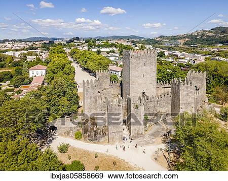 Stock Photo - Aerial view of castle of Guimaraes, first capital of Portugal. Fotosearch