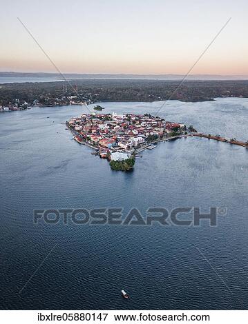 Aerial view of Flores at sunset, Flores, Guatemala, Central America View Large Photo Image Stock Photo - Aerial view of Flores at sunset, Flores, Guatemala, Central America. Fotosearch