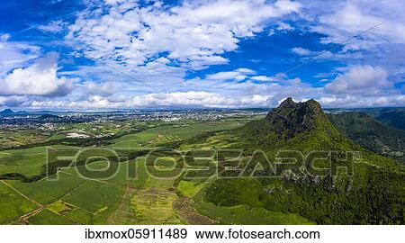 Stock Photo - Aerial view of Mont du Rempart with Trois Mamelles, sugar cane fields, Black River region, Mauritius, Africa. Fotosearch