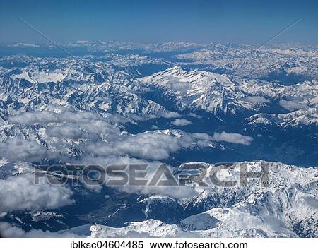 Aerial view of snow-covered Alps, Austria, Europe View Large Photo Image Stock Photography - Aerial view of snow-covered Alps, Austria, Europe. Fotosearch