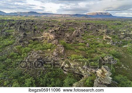 Stock Photograph - Aerial view of the lava field Dimmuborgir, Skútustaðir, Norðurland eystra, Iceland, Europe. Fotosearch