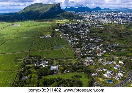 Aerial view of the Mountain Corps de Grande, sugar cane fields, Black River region, behind the towns of Vacoas-Phönix and Quatre Bornes, Mauritius, Africa View Large Photo Image Stock Image - Aerial view of the Mountain Corps de Grande, sugar cane fields, Black River region, behind the towns of Vacoas-Phönix and Quatre Bornes, Mauritius, Africa. Fotosearch