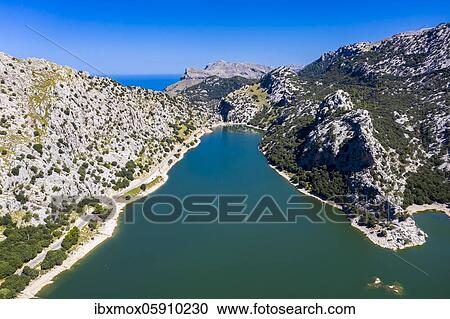 Stock Image - Aerial view of the reservoir, Embalse de Gorg Blau, Tramuntana, Majorca, Balearic Islands, Spain, Europe. Fotosearch