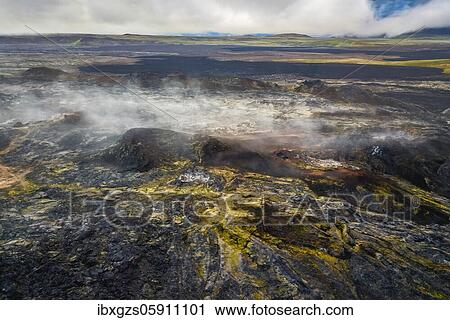 Stock Image - Aerial view of the steaming Krafla lava field with colorful rocks, Skútustaðir, Norðurland eystra, Iceland, Europe. Fotosearch