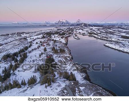 Aerial view of winter island landscape in the evening light off the coast, high mountain peaks in the background, Dønna, Nordland, Norway, Europe View Large Photo Image Stock Image - Aerial view of winter island landscape in the evening light off the coast, high mountain peaks in the background, Dønna, Nordland, Norway, Europe. Fotosearch