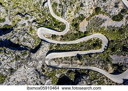 Aerial view, serpentine road MA-2141 to Sa Calobra, Serra de Tramuntana, Majorca, Balearic Islands, Spain, Europe View Large Photo Image Picture - Aerial view, serpentine road MA-2141 to Sa Calobra, Serra de Tramuntana, Majorca, Balearic Islands, Spain, Europe. Fotosearch