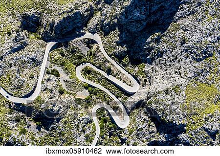 Aerial view, serpentine road MA-2141 to Sa Calobra, Serra de Tramuntana, Majorca, Balearic Islands, Spain, Europe View Large Photo Image Stock Image - Aerial view, serpentine road MA-2141 to Sa Calobra, Serra de Tramuntana, Majorca, Balearic Islands, Spain, Europe. Fotosearch