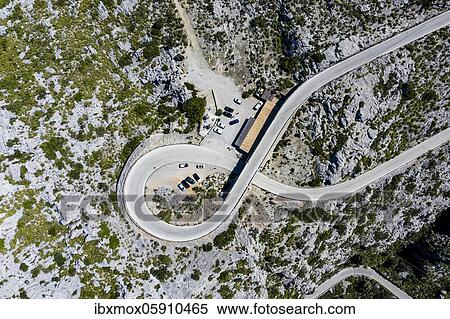 Aerial view, serpentine road MA-2141 to Sa Calobra, Serra de Tramuntana, Majorca, Balearic Islands, Spain, Europe View Large Photo Image Stock Photography - Aerial view, serpentine road MA-2141 to Sa Calobra, Serra de Tramuntana, Majorca, Balearic Islands, Spain, Europe. Fotosearch
