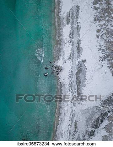 Aerial view, snowy beach, coast, Flakstad, Norway, Europe View Large Photo Image Picture - Aerial view, snowy beach, coast, Flakstad, Norway, Europe. Fotosearch