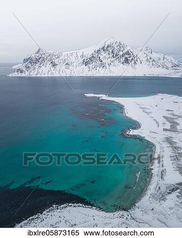 Aerial view, snowy beach, coast, Flakstad, Norway, Europe View Large Photo Image Stock Photography - Aerial view, snowy beach, coast, Flakstad, Norway, Europe. Fotosearch