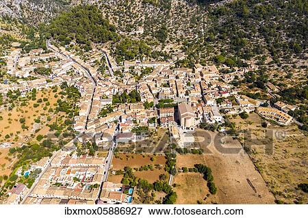Aerial view, the village Caimari municipality Selva at the edge of the Tramuntana mountains with agriculture, island centre, Majorca, Balearic Islands, Spain, Europe View Large Photo Image Stock Photo - Aerial view, the village Caimari municipality Selva at the edge of the Tramuntana mountains with agriculture, island centre, Majorca, Balearic Islands, Spain, Europe. Fotosearch