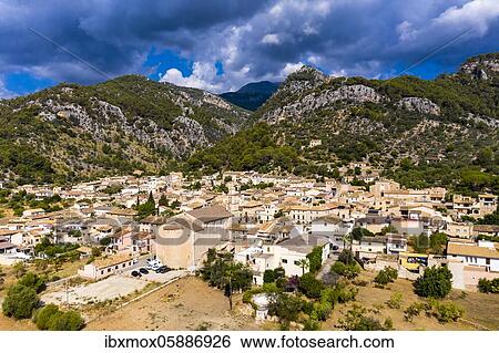 Aerial view, the village Caimari municipality Selva at the edge of the Tramuntana mountains with agriculture, island centre, Majorca, Balearic Islands, Spain, Europe View Large Photo Image Stock Photograph - Aerial view, the village Caimari municipality Selva at the edge of the Tramuntana mountains with agriculture, island centre, Majorca, Balearic Islands, Spain, Europe. Fotosearch