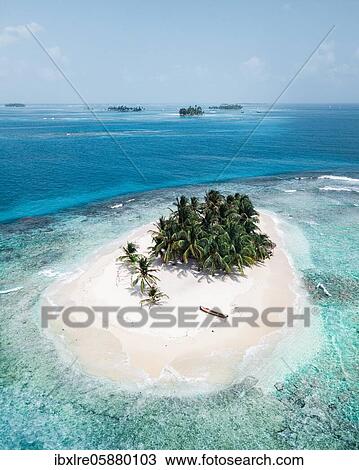 Aerial view, tropical island with palm trees, San Blas Islands, Panama, Central America View Large Photo Image Stock Image - Aerial view, tropical island with palm trees, San Blas Islands, Panama, Central America. Fotosearch