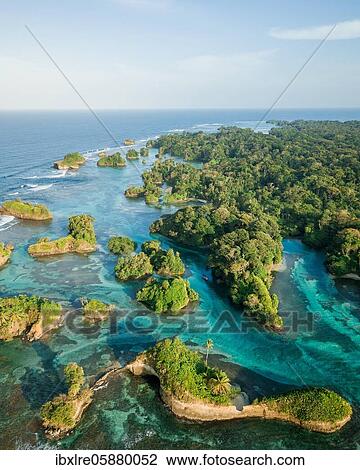 Stock Image - Aerial view, tropical mangrove islands in the Caribbean, Escudo de Veraguas, Panama, Central America. Fotosearch