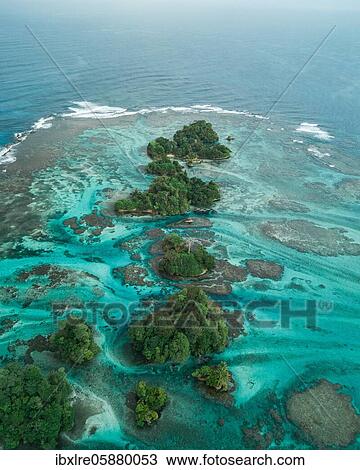 Stock Image - Aerial view, tropical mangrove islands in the Caribbean, Escudo de Veraguas, Panama, Central America. Fotosearch