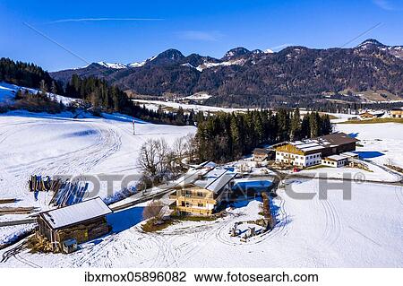 Aerial view, view of agricultural enterprises in the Leuken valley, Kössen, Kaiserwinkel, district of Kitzbühel, Chiemgau, Tyrol, Austria, Europe View Large Photo Image Stock Image - Aerial view, view of agricultural enterprises in the Leuken valley, Kössen, Kaiserwinkel, district of Kitzbühel, Chiemgau, Tyrol, Austria, Europe. Fotosearch