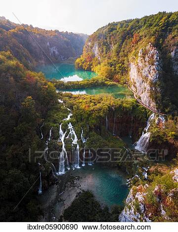 Stock Image - Aerial view, waterfall with Plitvice Lakes in autumn, National Park Plitvice Lakes, Dalmatia, Croatia, Europe. Fotosearch