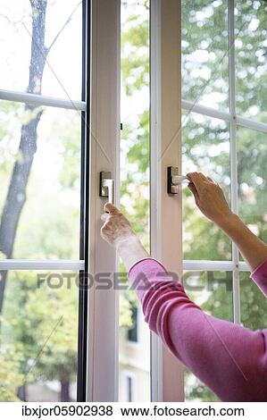 Airing in a classroom, Teacher opens window to air, Austria, Europe View Large Photo Image Stock Photo - Airing in a classroom, Teacher opens window to air, Austria, Europe. Fotosearch