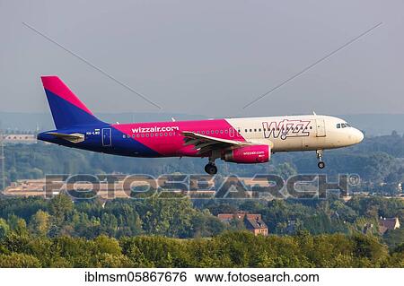 An Airbus A320 aircraft of Wizzair with the registration HA-LWD at Dortmund Airport (DTM), Dortmund, Germany, Europe View Large Photo Image Stock Photograph - An Airbus A320 aircraft of Wizzair with the registration HA-LWD at Dortmund Airport (DTM), Dortmund, Germany, Europe. Fotosearch