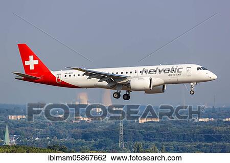 An Embraer 190 E2 aircraft of Helvetic Airways with registration number HB-AZD at Dortmund Airport (DTM), Dortmund, Germany, Europe View Large Photo Image Stock Image - An Embraer 190 E2 aircraft of Helvetic Airways with registration number HB-AZD at Dortmund Airport (DTM), Dortmund, Germany, Europe. Fotosearch