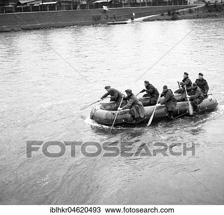Stock Image - Approx. 1939, 1941, training Wehrmacht, inflatable dinghy of the Wehrmacht on the Danube, Ulm, Germany, Europe. Fotosearch