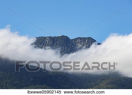 Band of clouds around mountain peak Katrin, Bad Ischl, Salzkammergut, Upper Austria, Austria, Europe View Large Photo Image Stock Photography - Band of clouds around mountain peak Katrin, Bad Ischl, Salzkammergut, Upper Austria, Austria, Europe. Fotosearch