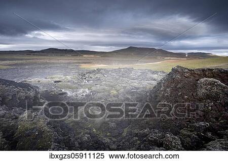 Black solidified lava in green plain with steam, Leihrnjukur in the Krafla, Krafla lava field, Skútustaðir, Norðurland eystra, Iceland, Europe View Large Photo Image Stock Photography - Black solidified lava in green plain with steam, Leihrnjukur in the Krafla, Krafla lava field, Skútustaðir, Norðurland eystra, Iceland, Europe. Fotosearch