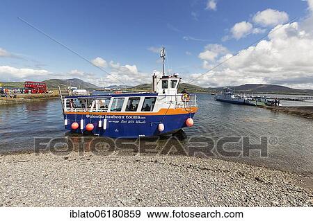Boat with wheels, amphibious vehicle with tourists, Knightstown, Valentia Island, coastal road Skellig Ring, Iveragh Peninsula, Wild Atlantic Way, Ireland, Europe View Large Photo Image Stock Photo - Boat with wheels, amphibious vehicle with tourists, Knightstown, Valentia Island, coastal road Skellig Ring, Iveragh Peninsula, Wild Atlantic Way, Ireland, Europe. Fotosearch