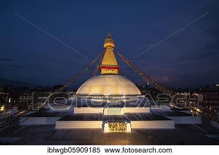 Stock Photography - Boudha Stupa with the all-seeing eyes of Buddha in the evening light, Boudanath, also Bodnath, Buddhist sanctuary and pilgrimage site in Kathmandu, Nepal, Asia. Fotosearch