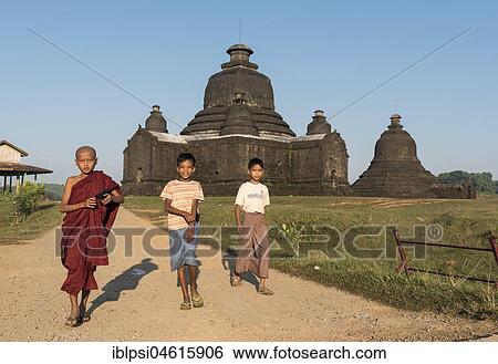 Boys play in front of Laymyetnha Paya, Lemyethna Temple, Mrauk U, Burma, Myanmar, Asia View Large Photo Image Stock Photograph - Boys play in front of Laymyetnha Paya, Lemyethna Temple, Mrauk U, Burma, Myanmar, Asia. Fotosearch