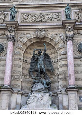 Bronze statue of the fountain La Fontaine Saint Michel at Place Saint-Michel, Paris, France, Europe View Large Photo Image Stock Image - Bronze statue of the fountain La Fontaine Saint Michel at Place Saint-Michel, Paris, France, Europe. Fotosearch