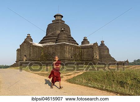 Buddhist monk outside Laymyetnha Paya, Lemyethna Temple, Mrauk U, Burma, Myanmar, Asia View Large Photo Image Stock Photo - Buddhist monk outside Laymyetnha Paya, Lemyethna Temple, Mrauk U, Burma, Myanmar, Asia. Fotosearch