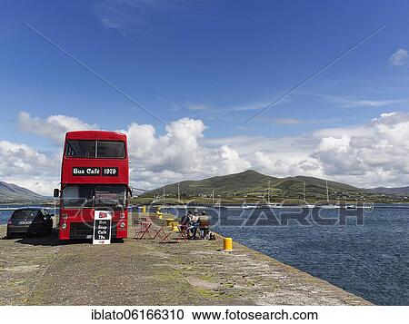 Stock Image - Café in a red double-decker bus, Bus Stop Café, Knightstown, Valentia Island, Coastal road Skellig Ring, Iveragh Peninsula, Wild Atlantic Way, Ireland, Europe. Fotosearch
