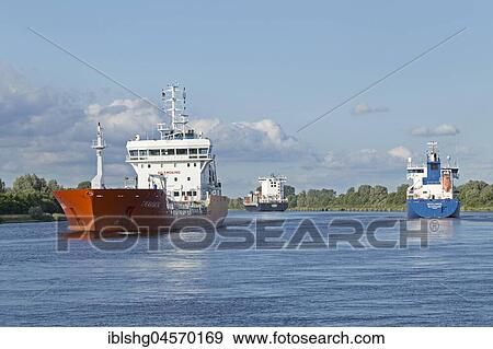 Cargo ships on the Kiel Canal, Schleswig-Holstein, Germany, Europe View Large Photo Image Stock Photo - Cargo ships on the Kiel Canal, Schleswig-Holstein, Germany, Europe. Fotosearch