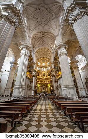 Stock Photo - Cathedral, interior with white columns and golden chancel, ceiling decorated with stucco, Catedral de Granada, Granada, Andalusia. Fotosearch