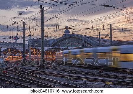 Stock Photograph - Central Station at dusk, Cologne, North Rhine-Westphalia, Germany, Europe. Fotosearch