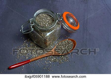 Chia, Chia seeds in glass and wooden spoon, Germany, Europe View Large Photo Image Stock Photo - Chia, Chia seeds in glass and wooden spoon, Germany, Europe. Fotosearch