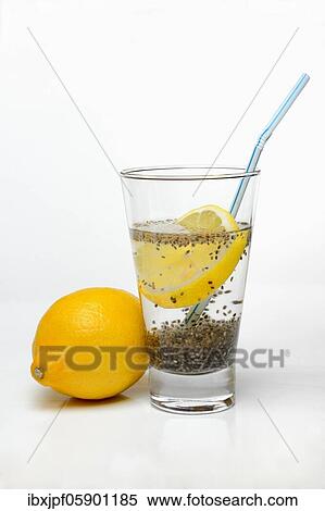Chia seeds, swollen, in glass of water with lemon slice, Germany, Europe View Large Photo Image Stock Photography - Chia seeds, swollen, in glass of water with lemon slice, Germany, Europe. Fotosearch