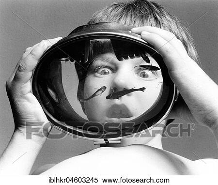 Child has small fish in his goggles, England, Great Britain View Large Photo Image Stock Photography - Child has small fish in his goggles, England, Great Britain. Fotosearch