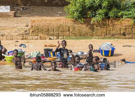 Children washing and playing Niger river, Niamey, Niger, Africa View Large Photo Image Stock Image - Children washing and playing Niger river, Niamey, Niger, Africa. Fotosearch