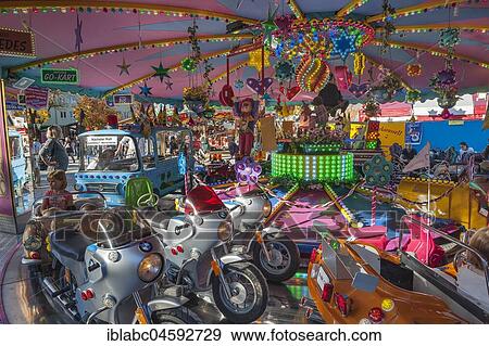 Stock Photo - Children's carousel, Auer Dult, Munich, Bavaria, Germany, Europe. Fotosearch