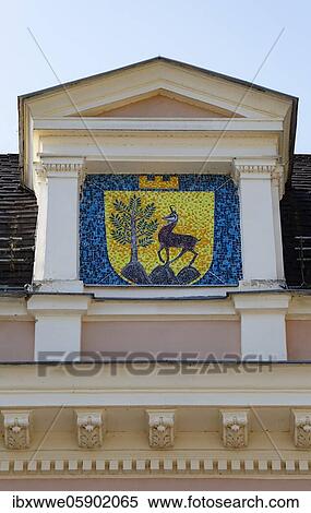 Stock Photography - City coat of arms of Bad Ischl at the congress and theatre house in the spa gardens, Bad Ischl, Salzkammergut, Upper Austria, Austria, Europe. Fotosearch