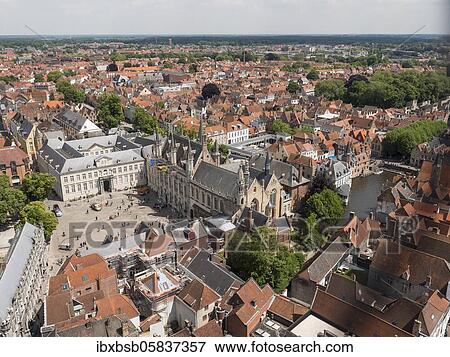 City view from the Belfort of Bruges Tower towards the Holy Blood Basilica and City Hall, Bruges, Flanders, Belgium, Europe View Large Photo Image Stock Photo - City view from the Belfort of Bruges Tower towards the Holy Blood Basilica and City Hall, Bruges, Flanders, Belgium, Europe. Fotosearch