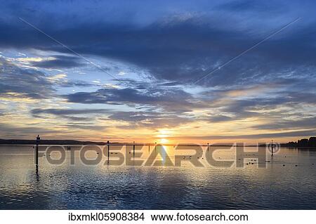 Cloud formation at sunrise over Lake Constance, moss, District of Constance, Baden-Württemberg, Germany, Europe View Large Photo Image Picture - Cloud formation at sunrise over Lake Constance, moss, District of Constance, Baden-Württemberg, Germany, Europe. Fotosearch