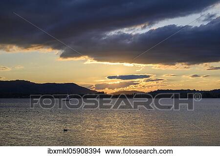 Cloud formation at sunset over Lake Constance, Radolfzell, District of Constance, Baden-Württemberg, Germany, Europe View Large Photo Image Picture - Cloud formation at sunset over Lake Constance, Radolfzell, District of Constance, Baden-Württemberg, Germany, Europe. Fotosearch