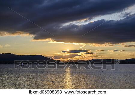 Cloud formation at sunset over Lake Constance, Radolfzell, District of Constance, Baden-Württemberg, Germany, Europe View Large Photo Image Stock Image - Cloud formation at sunset over Lake Constance, Radolfzell, District of Constance, Baden-Württemberg, Germany, Europe. Fotosearch