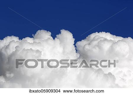 Cloud formation, white cumulus clouds, cumulus clouds in front of a blue sky, background image, North Rhine-Westphalia, Germany, Europe View Large Photo Image Picture - Cloud formation, white cumulus clouds, cumulus clouds in front of a blue sky, background image, North Rhine-Westphalia, Germany, Europe. Fotosearch