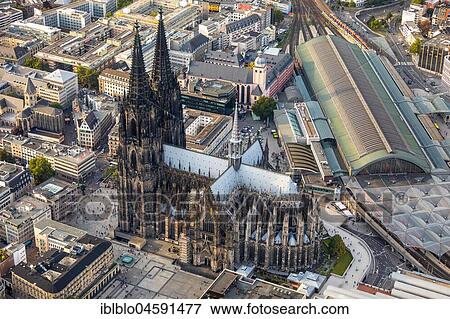Stock Photo - Cologne Cathedral and Cologne Central Station, Cologne Main Station, Domplatte, next to the Roman-Germanic Museum, Cologne, Rhineland, North Rhine-Westphalia, Germany, Europe. Fotosearch