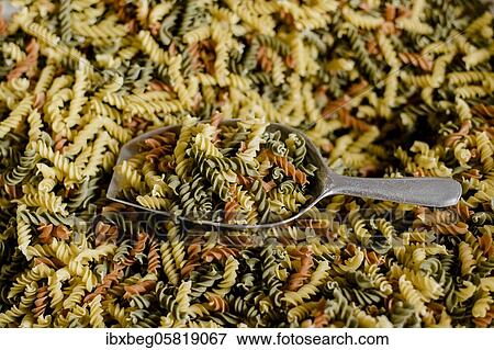 Stock Photo - Colourful spiral noodles. Fotosearch