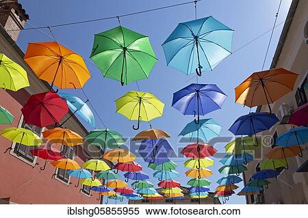 Colourful umbrellas suspended over a street, Novigrad, Istria, Croatia, Europe View Large Photo Image Stock Photography - Colourful umbrellas suspended over a street, Novigrad, Istria, Croatia, Europe. Fotosearch